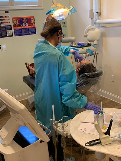patient receiving a dental crown in Port Orange, FL