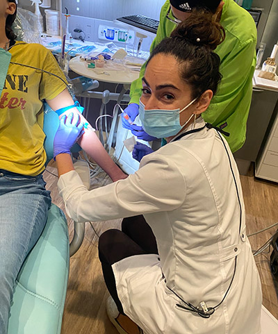 staff member applying dental crowns to a Cape Vista Dental patient